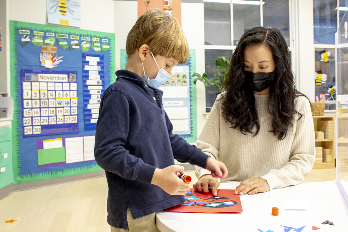 Student and teacher work together