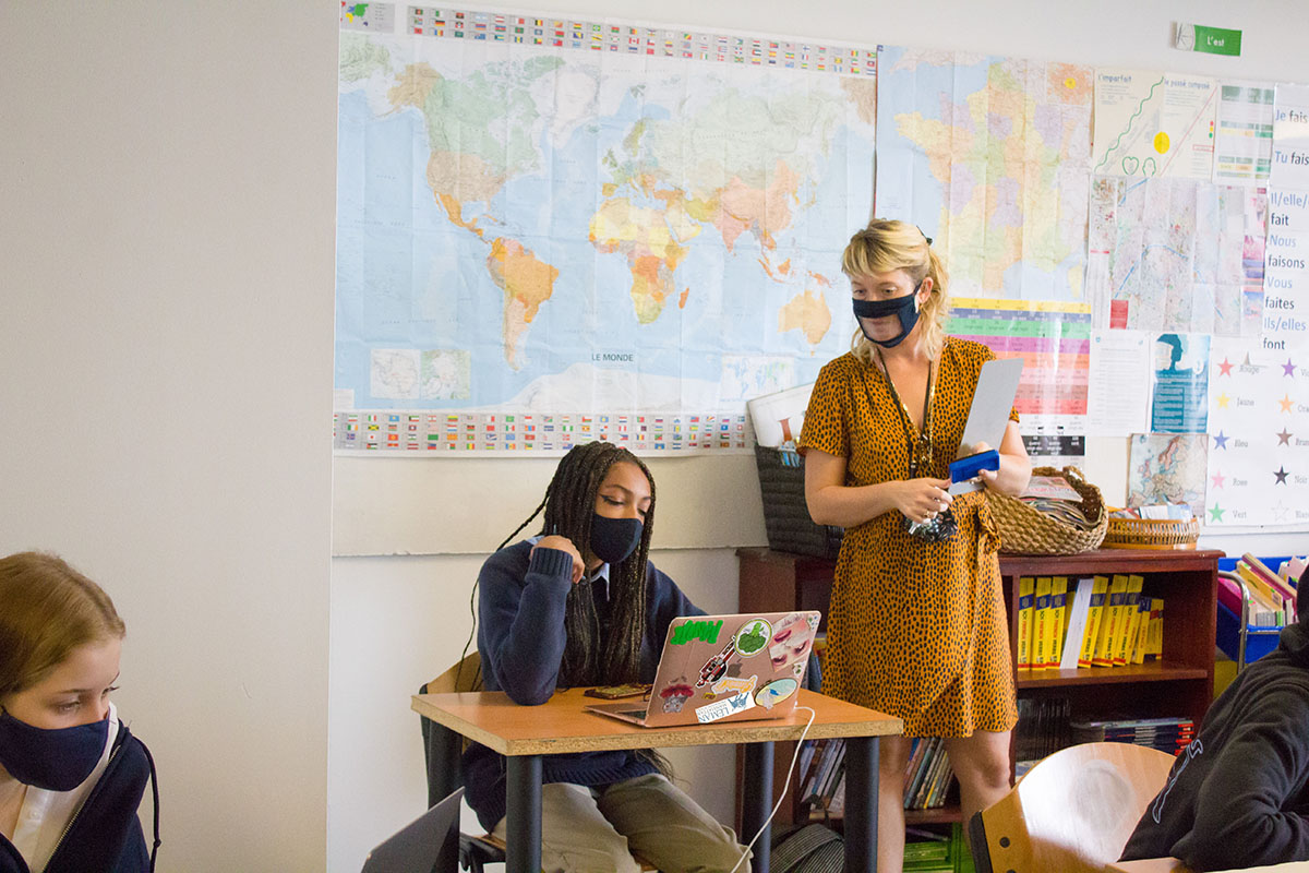 Teacher and student in classroom