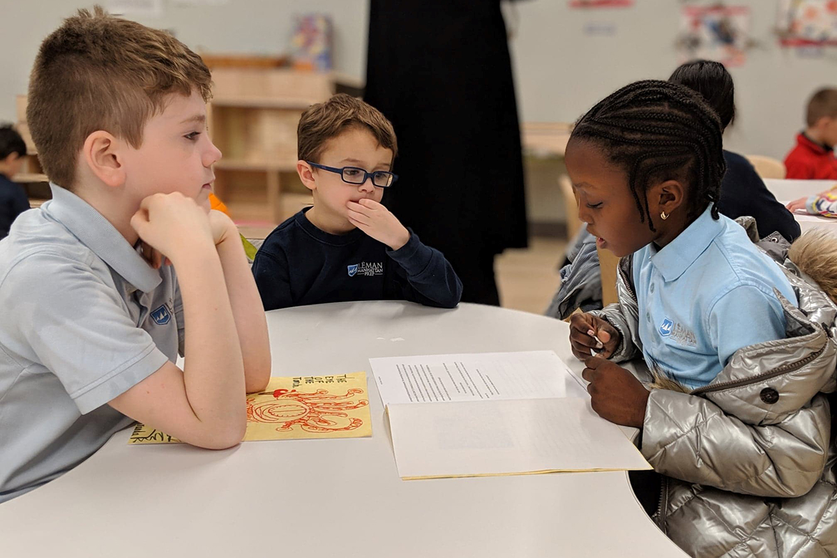 3rd graders read to PreK students